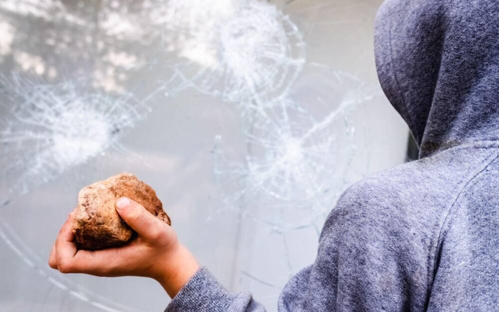 Breaking Glass With Stone