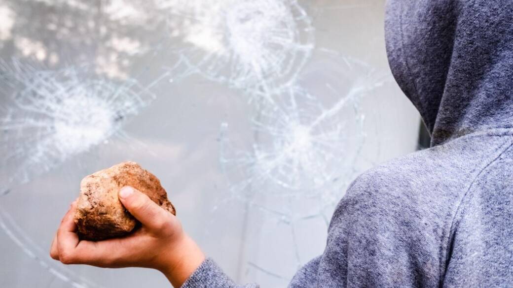 Breaking Glass With Stone