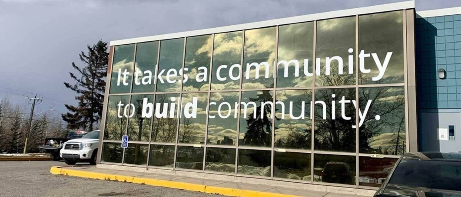 Custom Sign On Window Wall Of Building