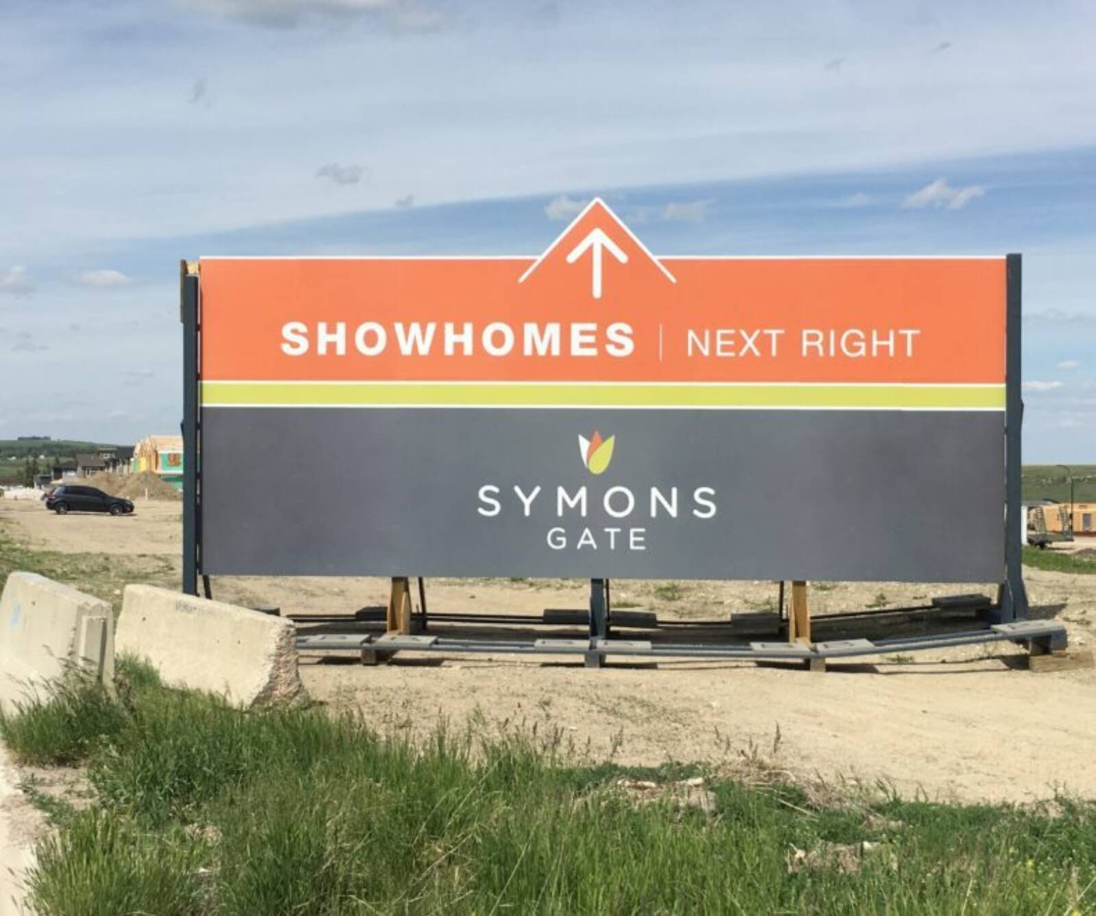 Symons Gate Showhomes Huge Directional Sign With Arrow Point At Top