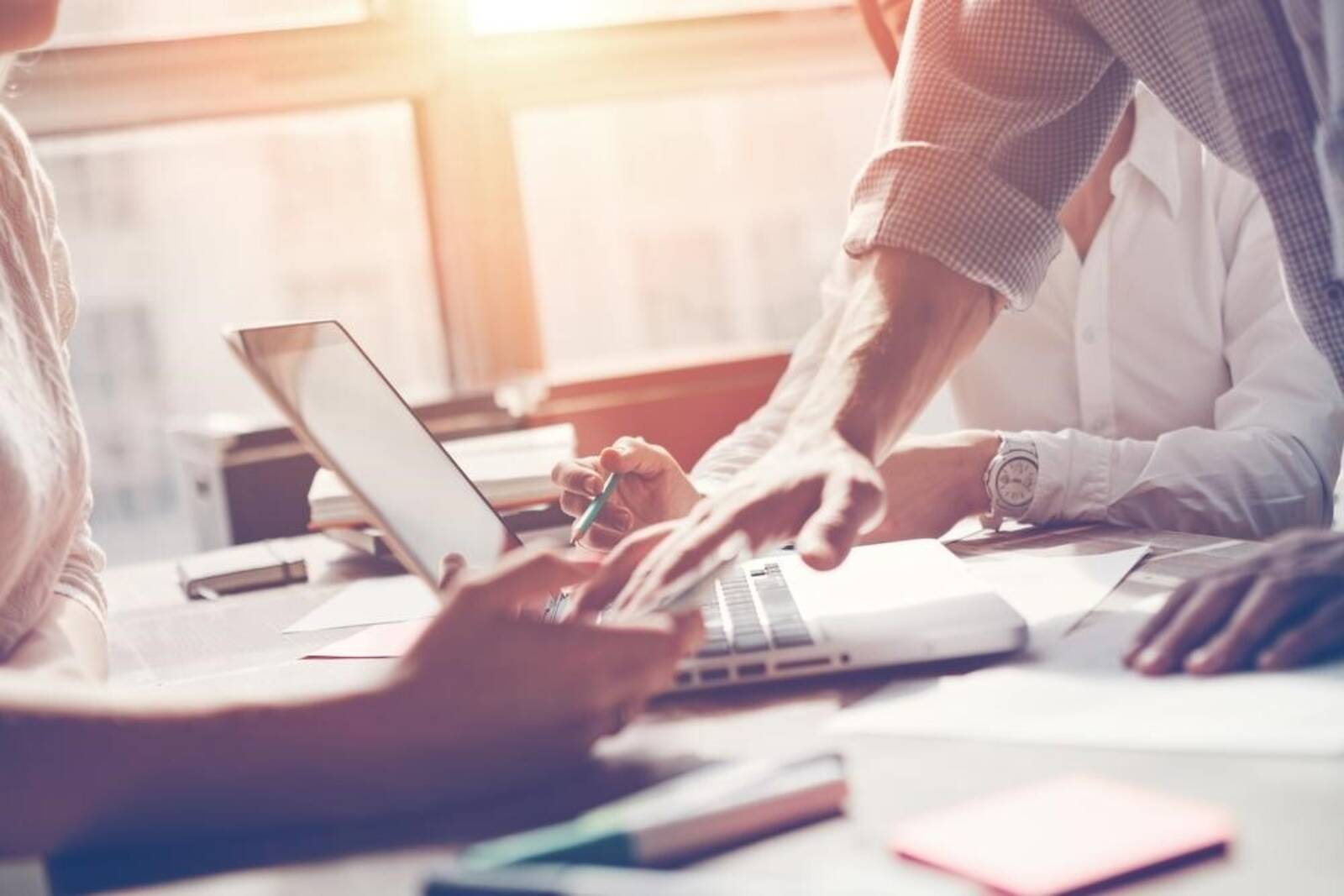 Team Working By An Office Window