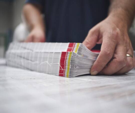 Saddlestich Books With Hands