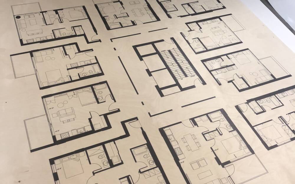 Nude Condo Floor Plans Printed On Wood Before Cutting